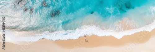 Overhead view of beautiful crystal water waves washing onshore on a pristine beach, sunny day. Tropical shoreline. Aerial drone like view. Generative AI. 