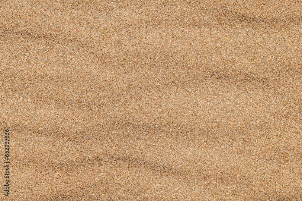 Close-up  background brown sand wave with rippled dunes. Top view. Space for text. Sand summer texture. - obrazy, fototapety, plakaty 