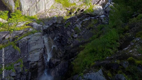 Waterfalls in a green valley.  photo