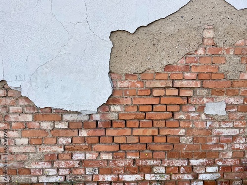 Empty Vintage Brick Wall Texture. Grungy Wide Brickwall. Grunge Red Stonewall Background. Old Building Facade With Damaged cover. Abstract Web Banner. Copy Space.