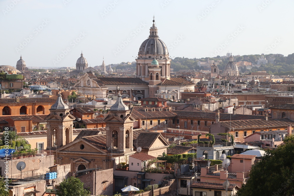 panorama of Rome with roofs and dome of St. Peter's Cathedral