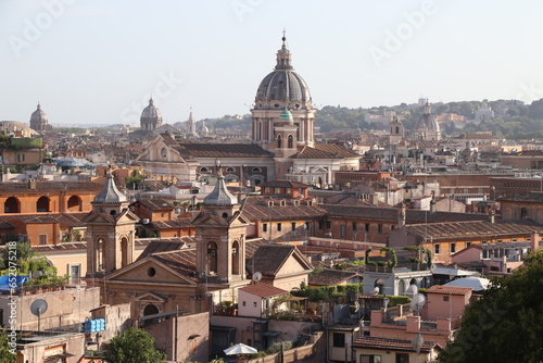 panorama of Rome with roofs and dome of St. Peter's Cathedral