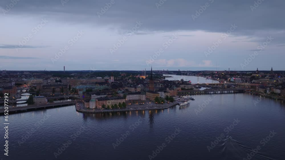 Aerial slide and pan shot of Riddarholmen Island and Kvarteret Luna with historic sights at dusk. Stockholm, Sweden Aerial slide and pan shot of Riddarholmen Island and Kvarteret Luna with historic sights at dusk. Stockholm, Sweden
