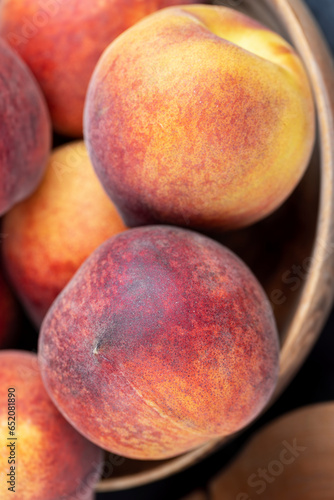 ripe delicious and fresh peaches of a red hue