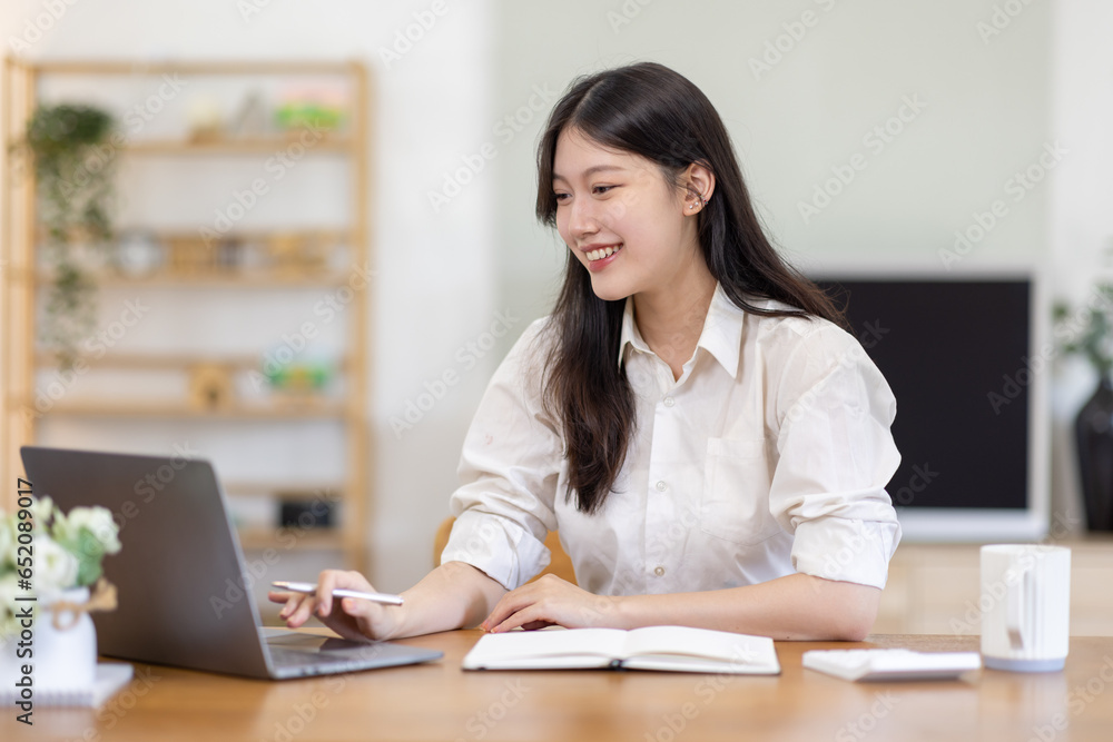 Serious young adult business asian woman or young asian student brainstorming at home work. Serious young adult business asian woman or young asian student brainstorming at home work.