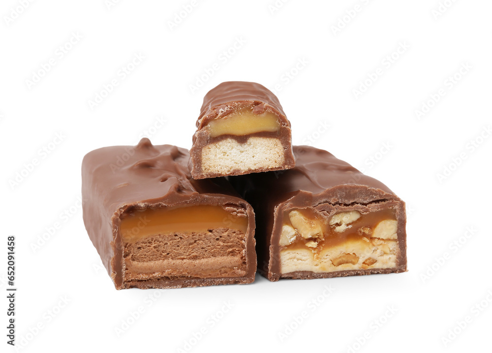 Pieces of different tasty chocolate bars on white background