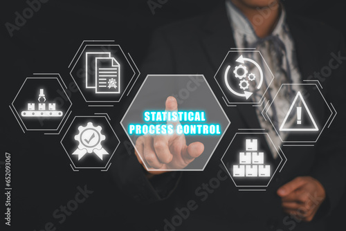 Statistical process control concept, Business woman hand touching statistical process control icon on virtual screen.