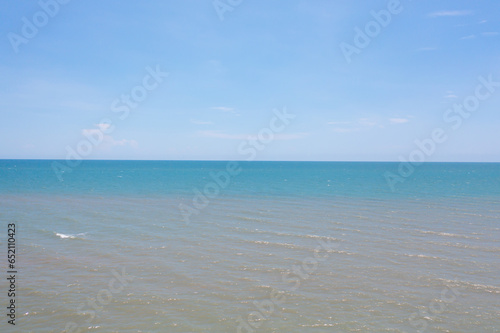 Aerial view of clear blue turquoise seawater  Andaman sea in Phuket island in summer season  Thailand. Water in ocean pattern texture wallpaper background.