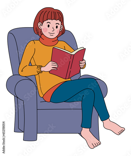 Girl reading a book on sofa
