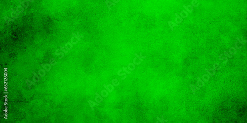 Green texture background with bright center spotlight