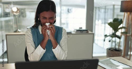 Business woman, sick and blowing nose in office for allergies, cold and virus. Indian employee sneeze with tissue for infection of influenza, allergy and risk of bacteria, sinusitis and hayfever photo