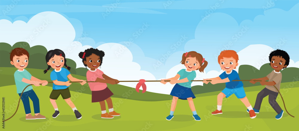 Group of multi ethnic kids pulling rope playing tug of war game in the park