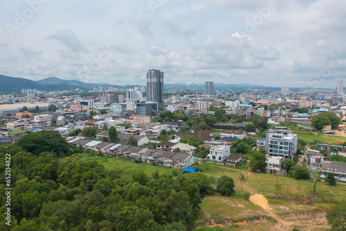 Aerial view of residential neighborhood roofs. Urban housing development from above. Top view. Real estate in Phuket, southern province city, Thailand. Property real estate. photo