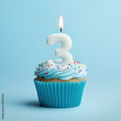 Birthday Cupcake With Number three, Candle cupcake with a candle in the shape of the number 3