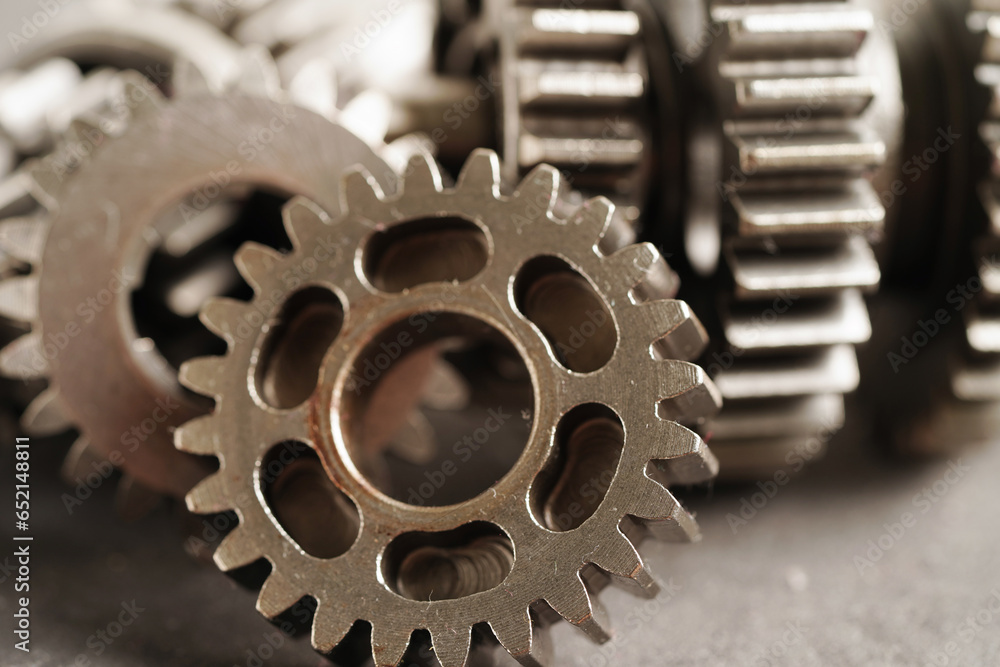 Metal gear wheel engine car and bike, mechanic industry concept. Metal gear wheel engine car and bike, mechanic industry concept.