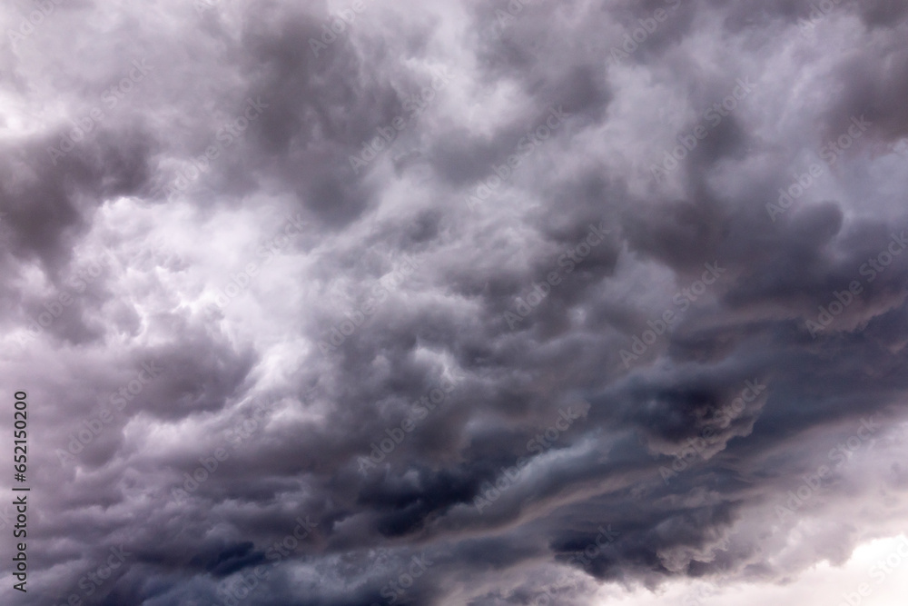 Dramatic dark clouds short before a thunderstorm and heavy rain Dramatic dark clouds short before a thunderstorm and heavy rain