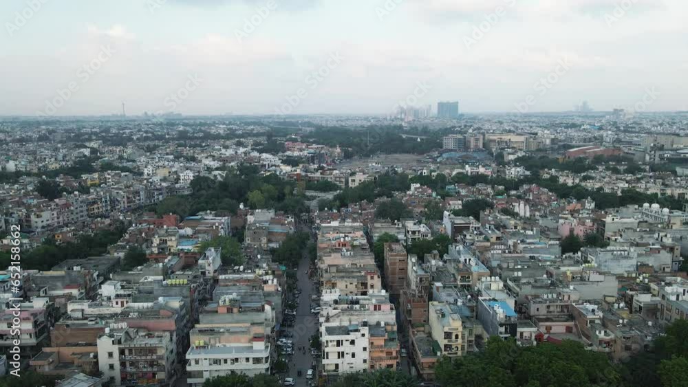 4K Aerial Shots of New Delhi Residential Suburbs on a beautiful day gliding over Rooftops, streets, parks and markets in India 4K Aerial Shots of New Delhi Residential Suburbs on a beautiful day gliding over Rooftops, streets, parks and markets in India