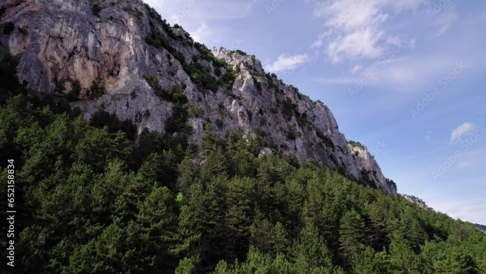majestic karts mountain during a sunny summer, surrounded by forest, slow move in majestic karts mountain during a sunny summer, surrounded by forest, slow move in