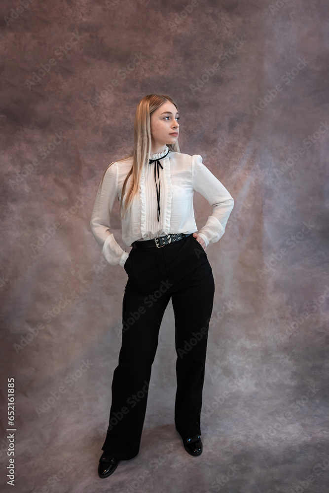 full-lenght portrait of a young business woman, studio shoot full-lenght portrait of a young business woman, studio shoot