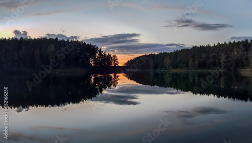 Calm lake scape at summer night.