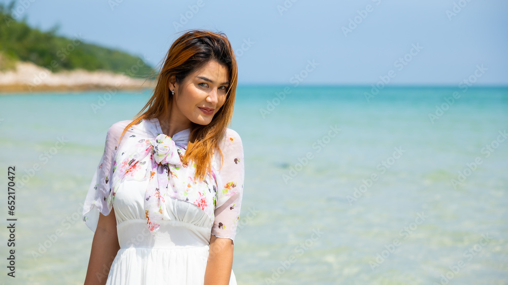 portrait Attractive Happy beautiful sexy female wearing swimwear enjoying and walking on tropical beach. Vacation trip summer holiday. portrait Attractive Happy beautiful sexy female wearing swimwear enjoying and walking on tropical beach. Vacation trip summer holiday.