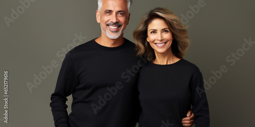 couple middle age woman and man wearing black sweater