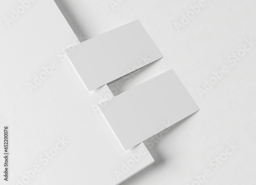 Two white business card Mockup. Textured calling card template on a blank surface. 3D rendering