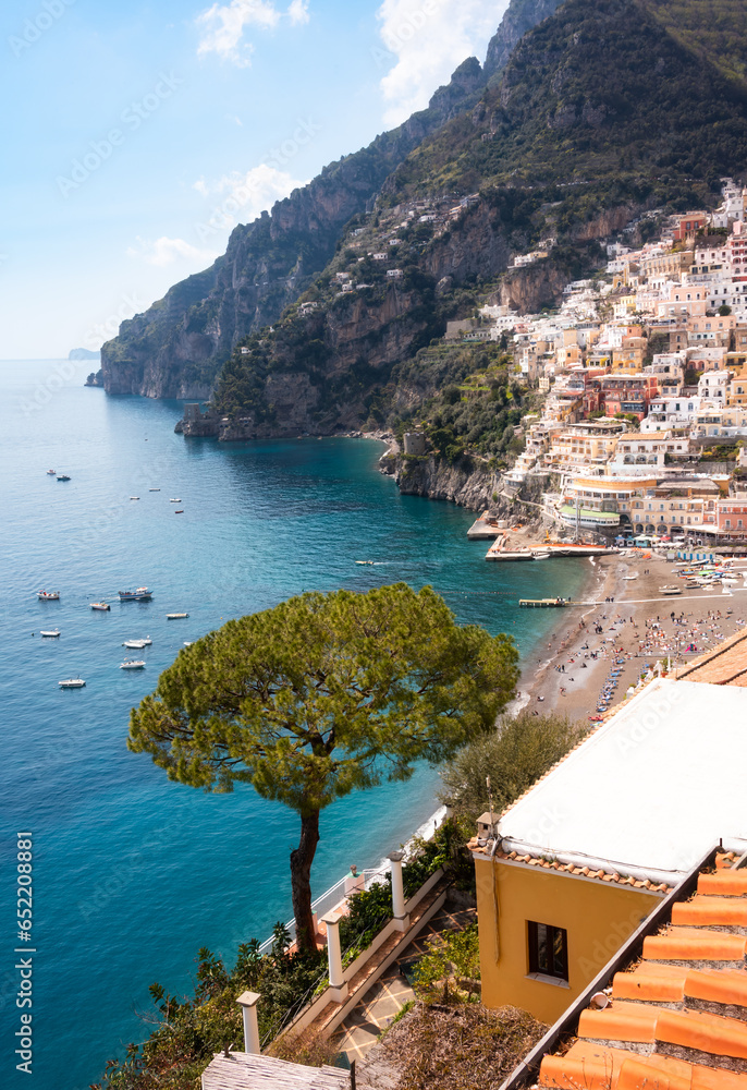 Pine tree and Positano town on Amalfi coast in Italy