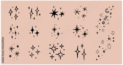 Set of hand drawn vector stars and sparkles, doodle style
