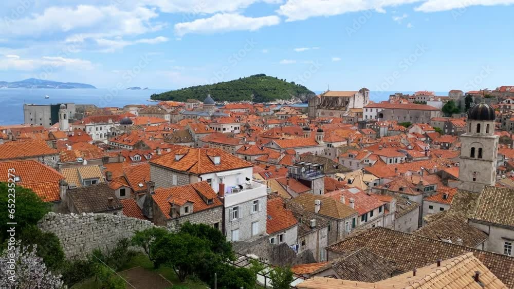 Dubrovnik a city in southern Croatia fronting the Adriatic Sea, Europe. Old city center of famous town Dubrovnik, Croatia. Picturesque view on Dubrovnik old town (medieval Ragusa) and Dalmatian Coast. Dubrovnik a city in southern Croatia fronting the Adriatic Sea, Europe. Old city center of famous town Dubrovnik, Croatia. Picturesque view on Dubrovnik old town (medieval Ragusa) and Dalmatian Coast.