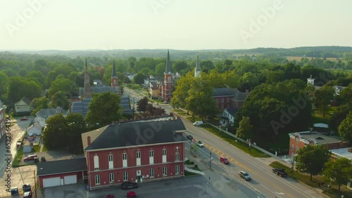 Drone shot of the 4 churches inDowntown Palmyra New York. Also the location of the first publication of the Book of Mormon.  Early church history. 60fps photo