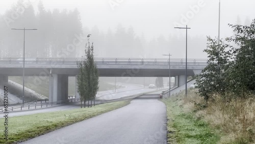 Kempele, Finland – 09/14/2023:Traffic in foggy weather photo