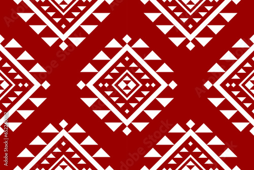 Fabric ethnic red pattern art. Geometric seamless pattern in tribal. American and Mexican style. Design for background, illustration, fabric, clothing, carpet, batik, embroidery.