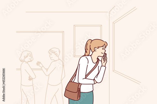Woman gallery visitor admiring paintings by famous artists, enjoying exhibits in museum of modern art. Young girl is happy to visit art gallery with photographs of professional authors