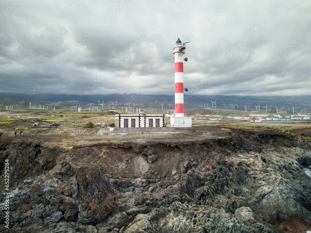 Aerial view of a picturesque lighthouse in El Poris de Abona, a charming coastal village