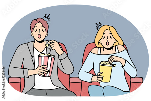 Couple eat popcorn enjoy movie in cinema. Emotional man and woman feel stunned with film in theater. Entertainment and weekend. Vector illustration.