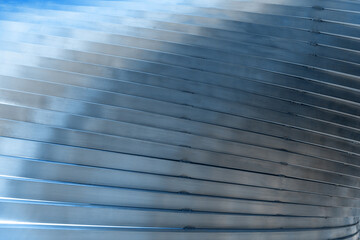 architecture and site concept - close up of modern building construction part over blue sky