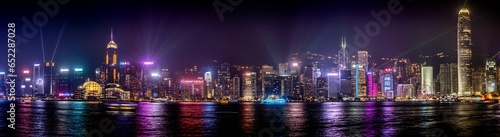 Photography Stunning view of Hong Kong Victoria Harbour at night, illuminated by lights