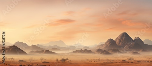 Sunrise in a hazy stone desert Spitzkoppe hills in Namibia African wildlife extreme wilderness adventures