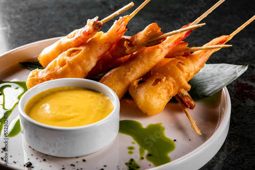 crispy Prawn tempura with garlic sauce on plate