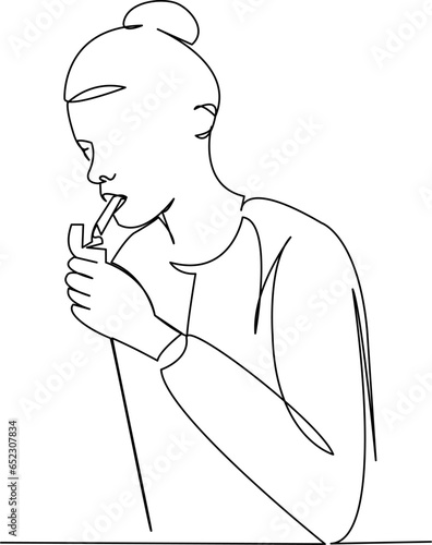 girl lights a cigarette