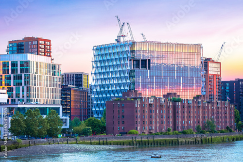 Obraz na plátně London Thames river waterfront and US Embassy sundown view