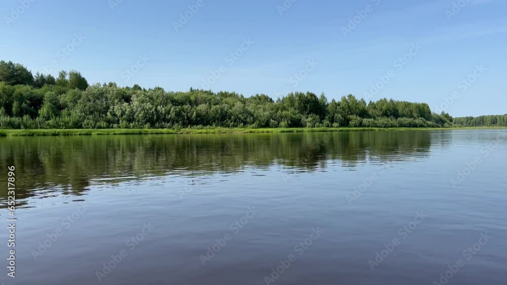 River flows clip taken from a boat traveling in summer day. russia River flows clip taken from a boat traveling in summer day. russia