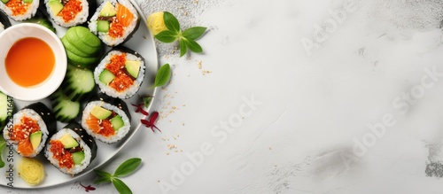 Vegan sushi with avocado cucumber tofu on gray background top view Healthy food idea