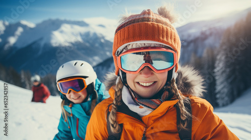 winter, extreme sport and people concept - happy friends having fun on the snow and making selfie.