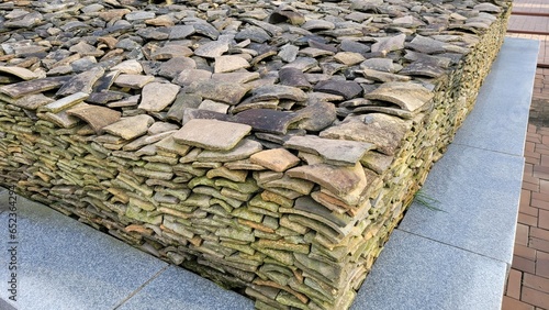 A place where tiles are piled up at the entrance to the Baekje royal palace site in Iksan, Jeollabuk-do, South Korea photo