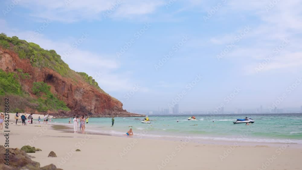 Koh Larn Pattaya, Thailand, August 21,2023 : Beautiful Beach is Nual Beach, Koh Larn Chonburi Province ,Thailand. tourists coming to rest on vacation at Koh Larn Pattaya,Thailand Koh Larn Pattaya, Thailand, August 21,2023 : Beautiful Beach is Nual Beach, Koh Larn Chonburi Province ,Thailand. tourists coming to rest on vacation at Koh Larn Pattaya,Thailand