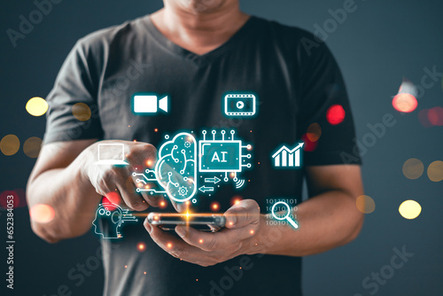 Man touch icon ai and use smartphone, Marketers education, research, analyze media video streaming content creation and online marketing strategies to grow their digital business. photo