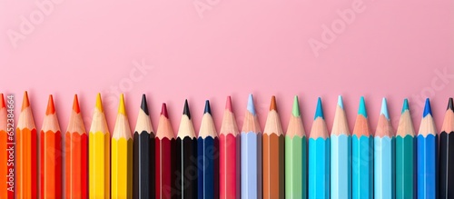 Various colored pencils for artistic drawing materials isolated pastel background Copy space