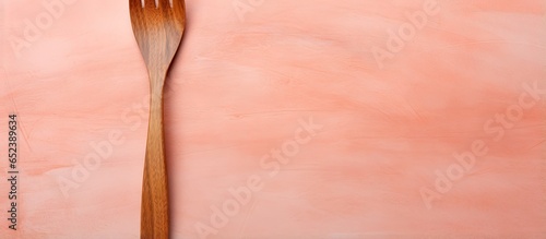 Wooden cutlery against a is...
